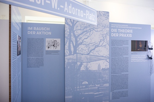 Station »University« with street sign »Theodor-W.-Adorno-Platz« and video